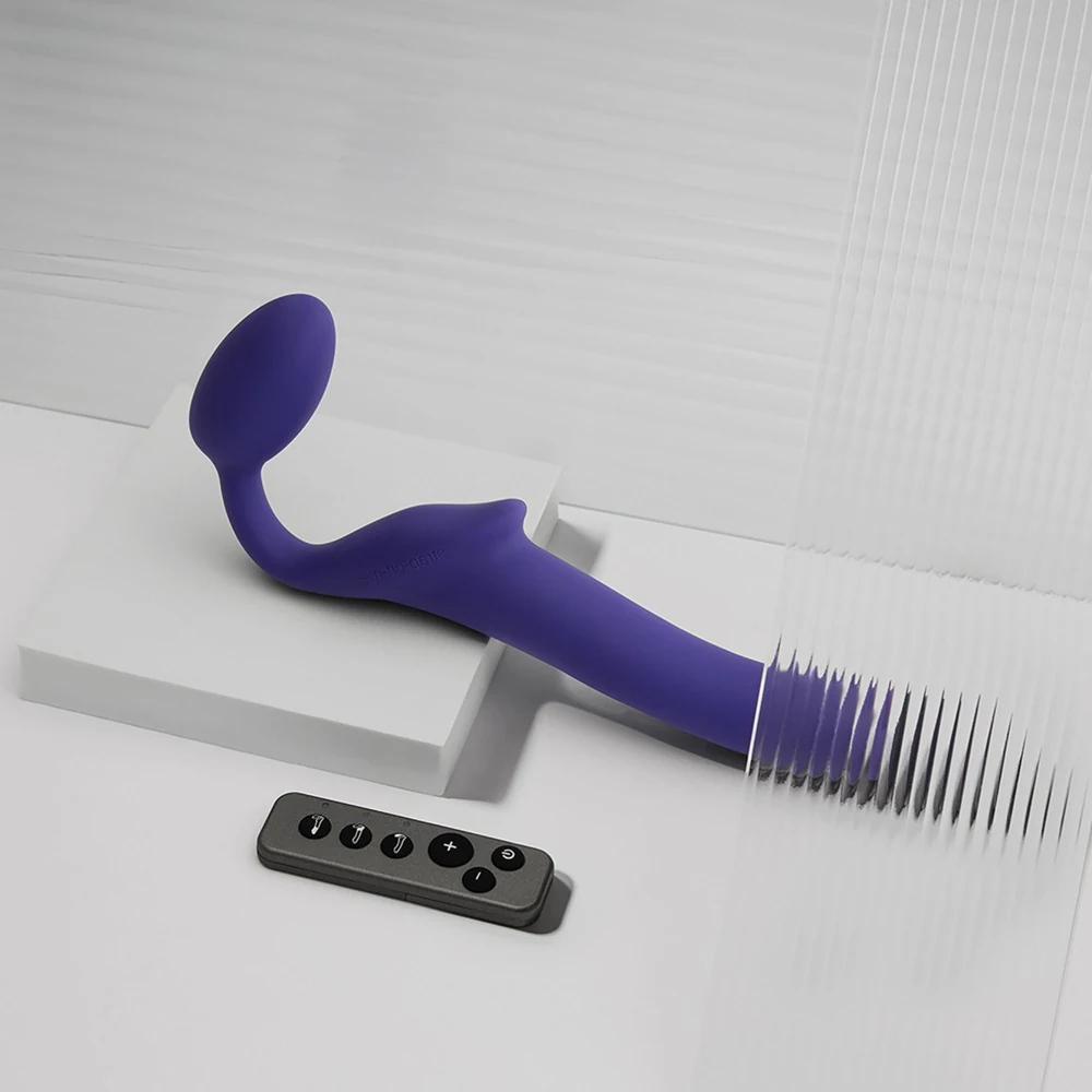 Vibrerende buigbare strap-on met afstandsbediening