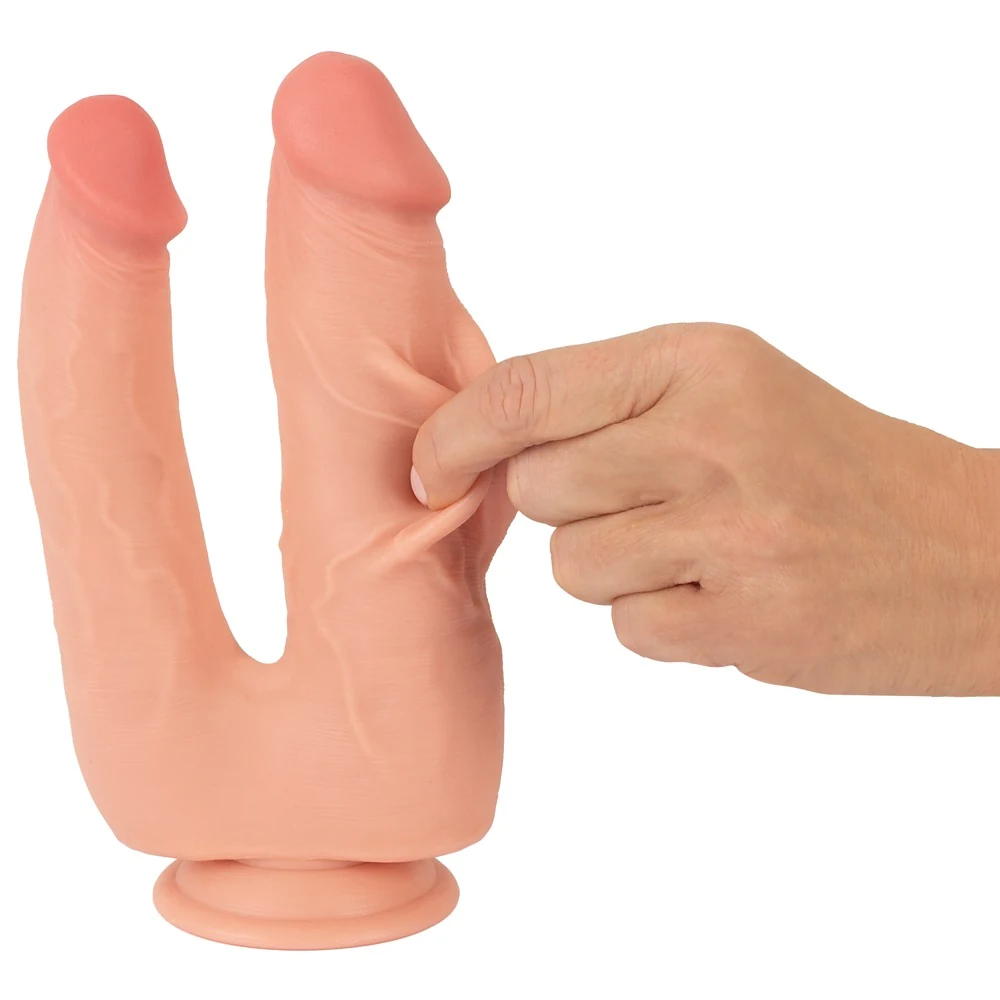 Buigbare dubbele penetrator met beweegbare huid