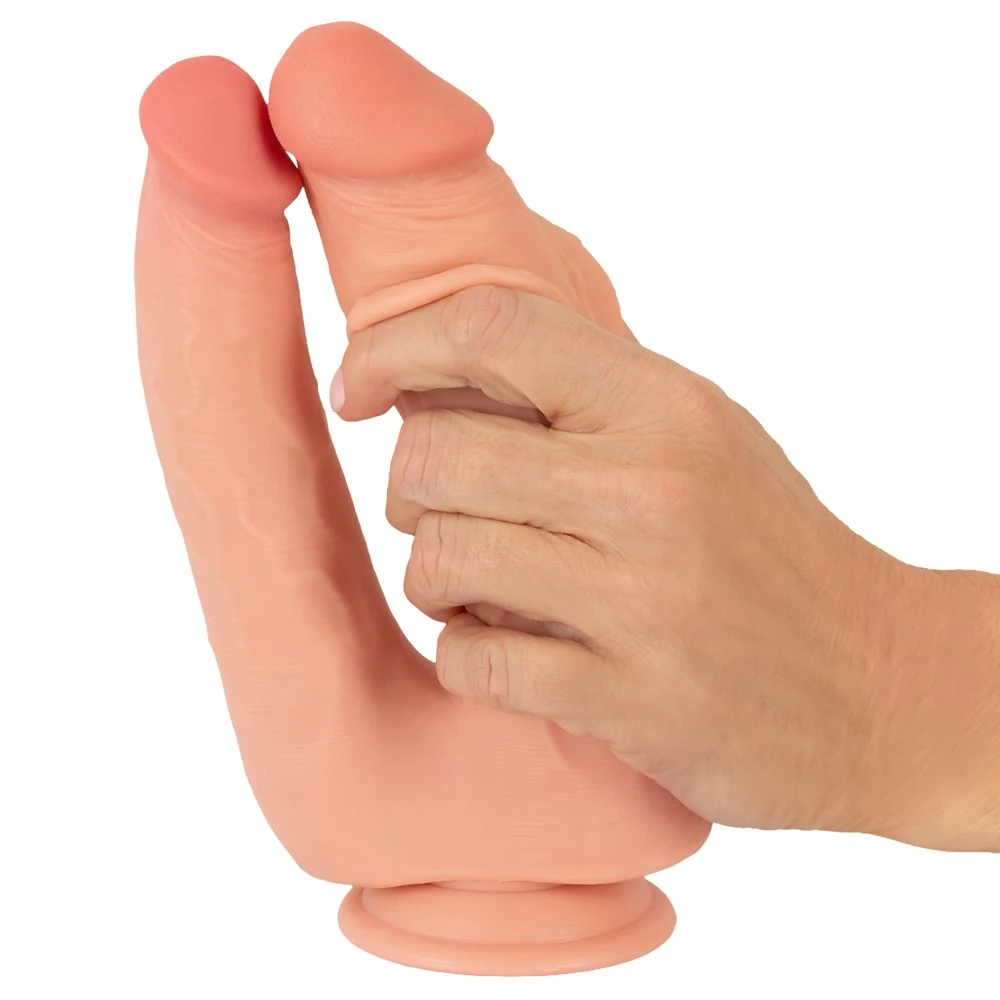 Buigbare dubbele penetrator met beweegbare huid